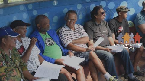 Workshop participants listening